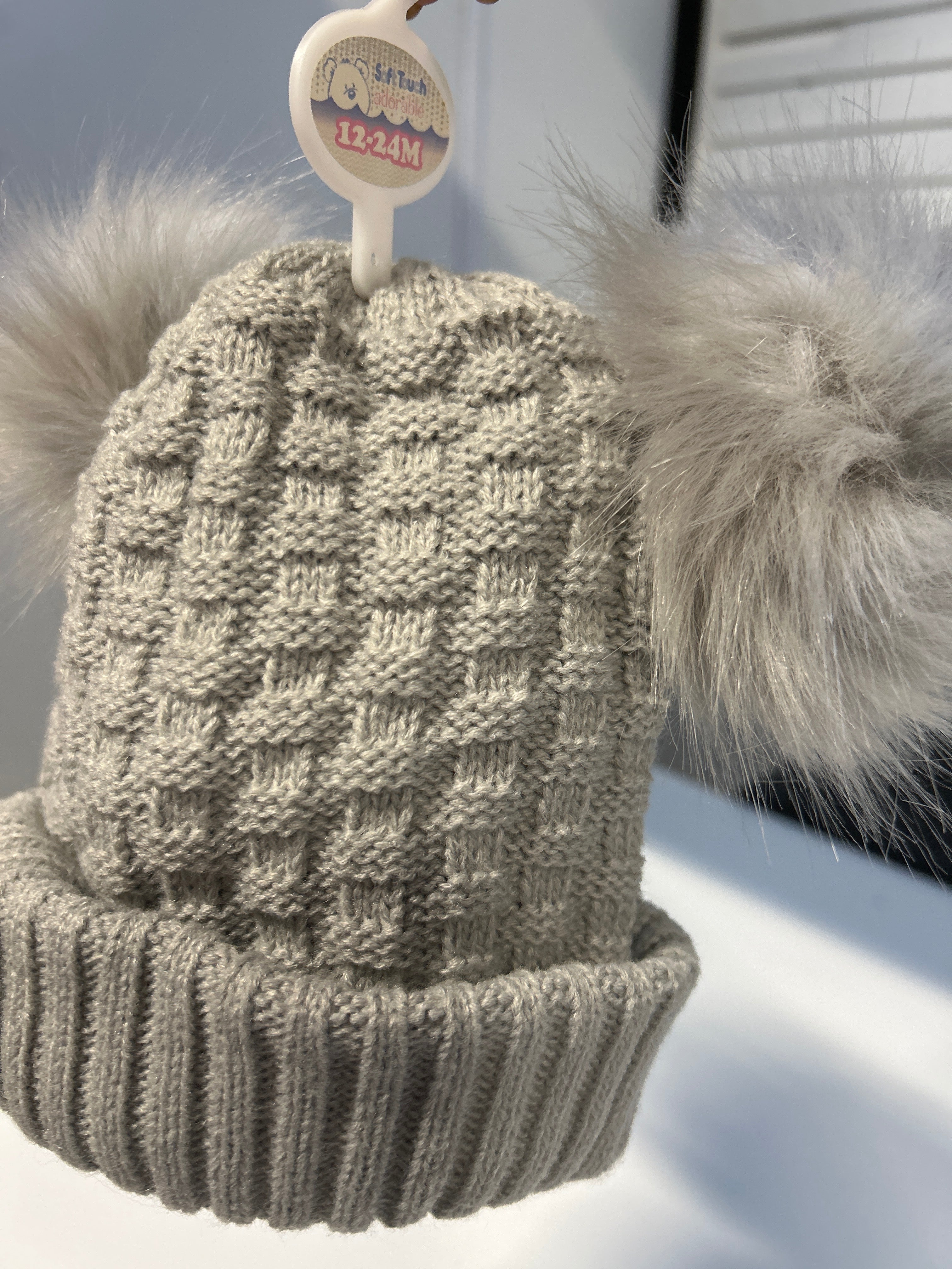 Grey knitted Pom Pom