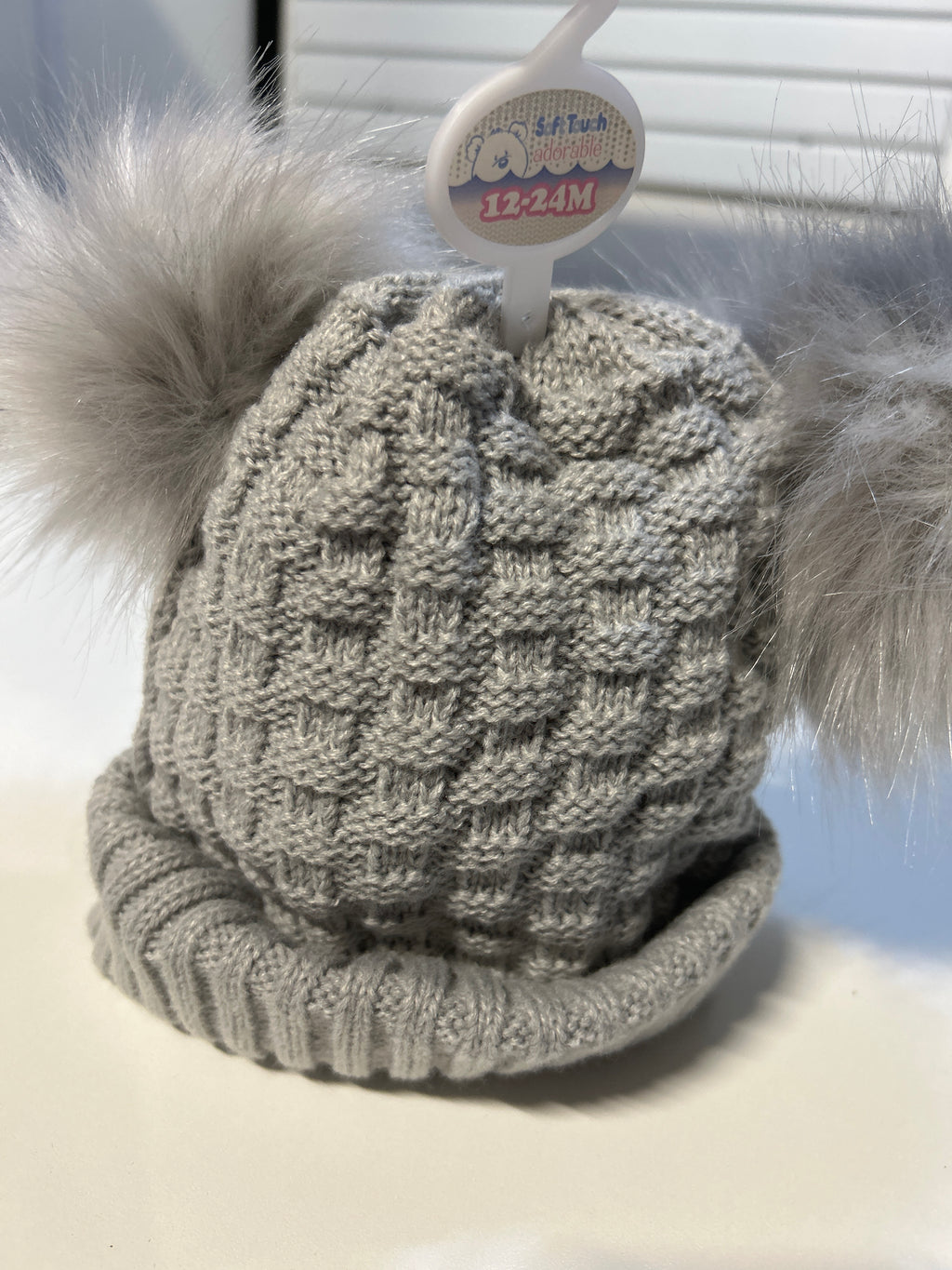 Grey knitted Pom Pom