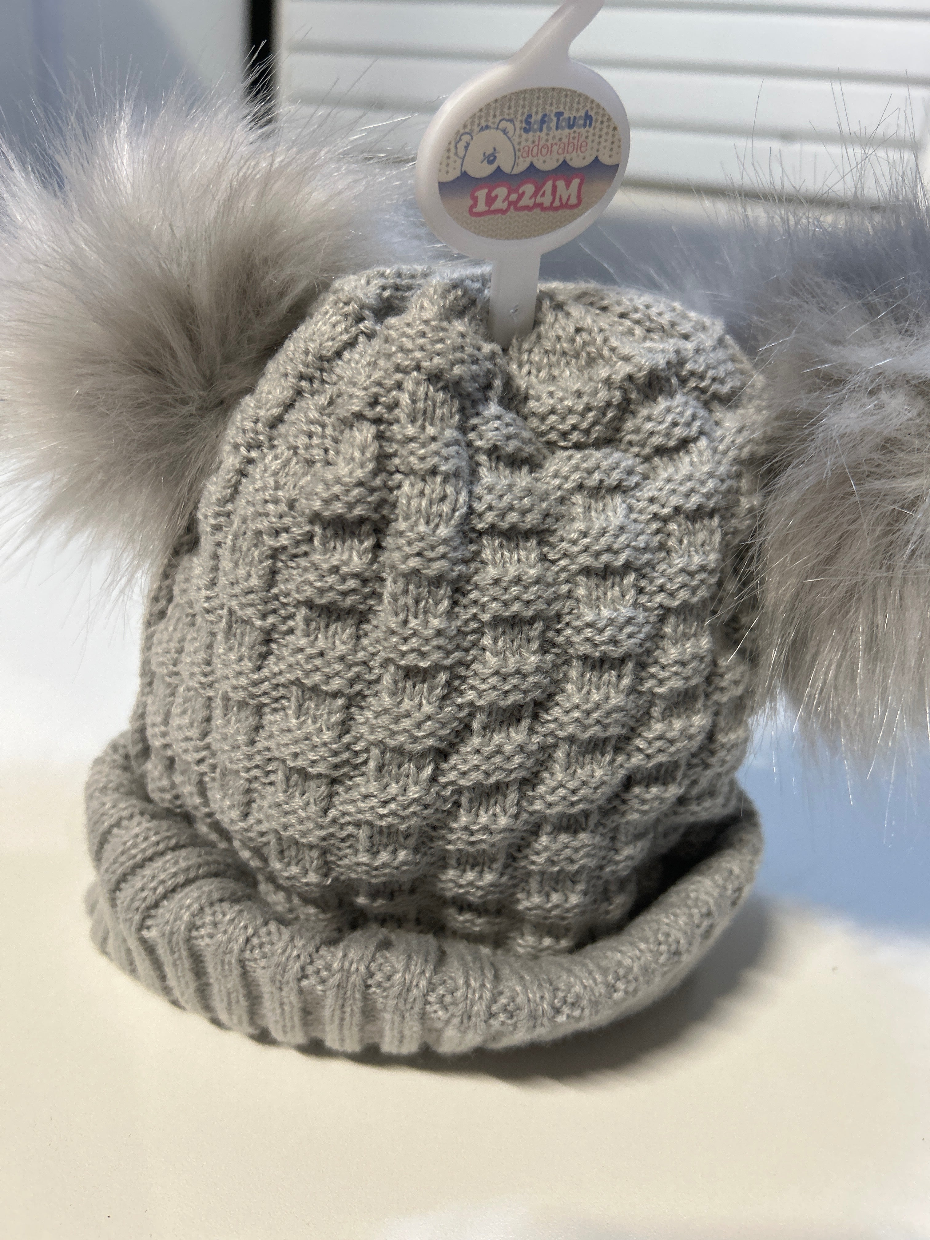 Grey knitted Pom Pom